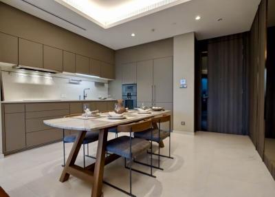 Modern kitchen with dining area and well-appointed fixtures