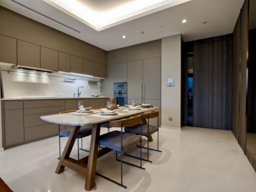 Modern kitchen with dining area and well-appointed fixtures