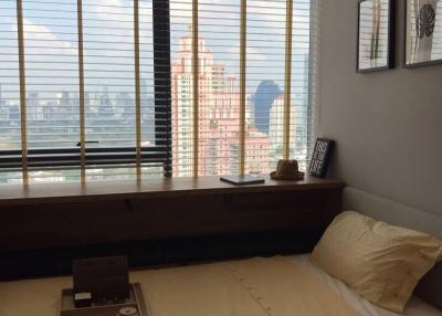 Cozy bedroom with a city view