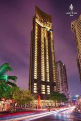 Illuminated high-rise building at dusk