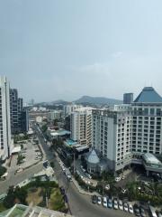 City skyline and streets viewed from a high-rise building window