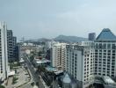 City skyline and streets viewed from a high-rise building window