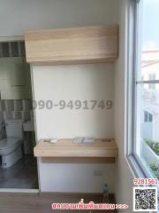 Compact bathroom with wooden cabinet and white interior