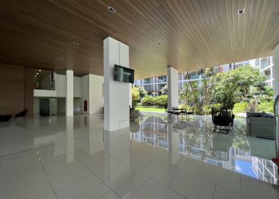 Spacious modern lobby with high ceilings and glossy floor