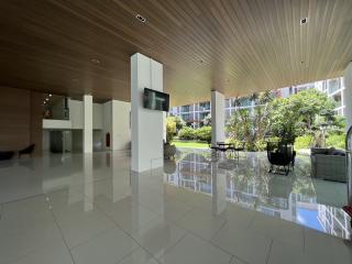Spacious modern lobby with high ceilings and glossy floor