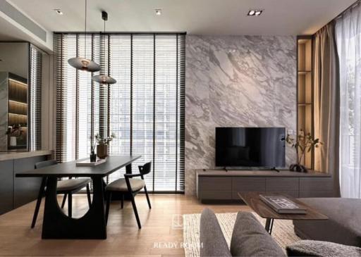 Modern living room with marble wall and contemporary furniture