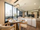 Modern living room with dining area and city view