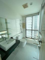 Modern white bathroom with natural light