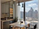 Modern kitchen with dining area and city view through floor-to-ceiling windows