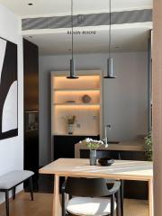Modern kitchen with dining area and stylish pendant lighting