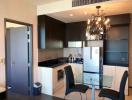 Modern kitchen with dining area and appliances