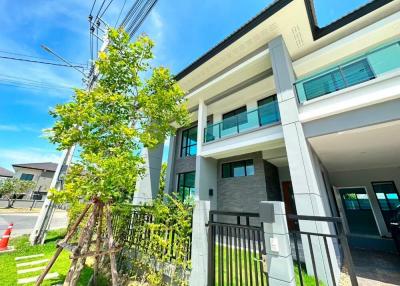 Modern two-story house with a clear blue sky