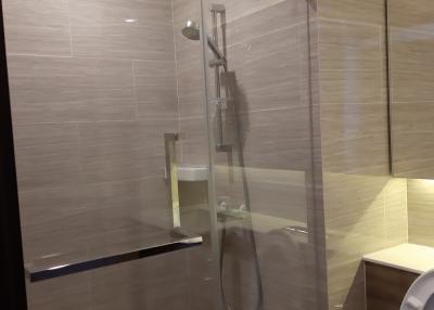 Modern bathroom interior with glass shower enclosure