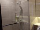 Modern bathroom interior with glass shower enclosure