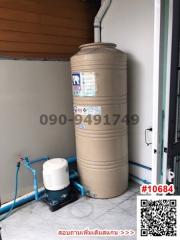 Water filtration system and storage tank in a home utility space