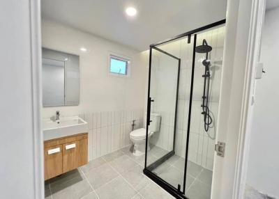 Modern bathroom with glass shower and clean design