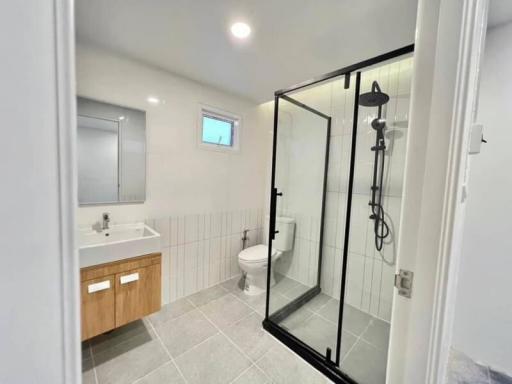 Modern bathroom with glass shower and clean design