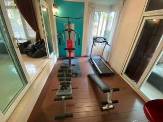 Home gym area with exercise equipment