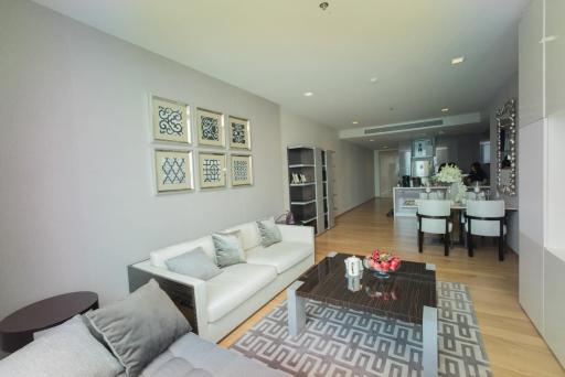 Modern living room leading to an open plan kitchen