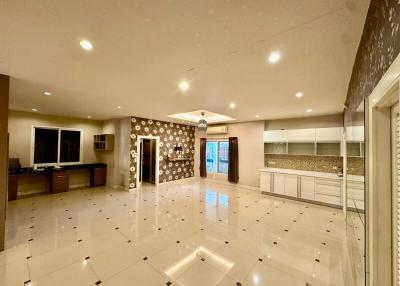 Spacious kitchen with modern appliances and ample lighting