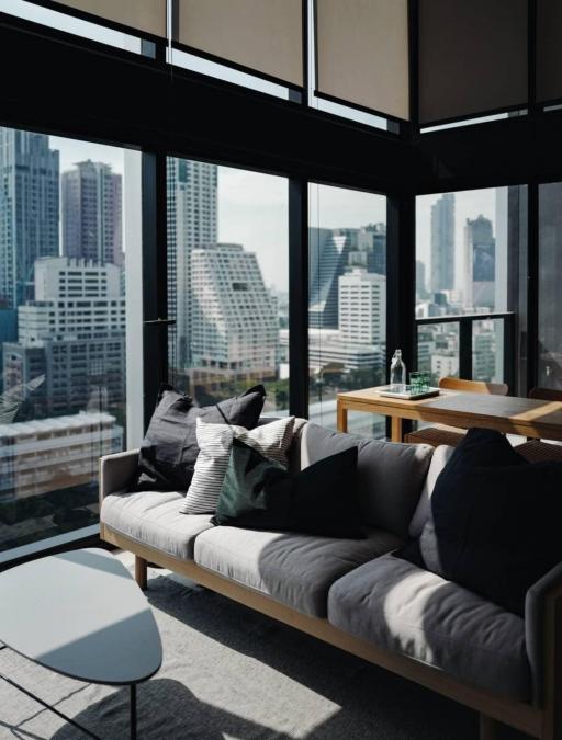 Cozy modern living room with a city view