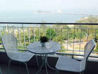 Balcony with sea view featuring a small table and two chairs