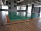 Indoor swimming pool in modern residential building