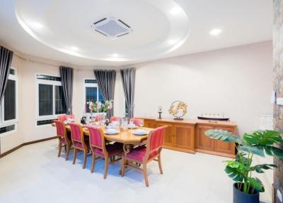 Elegant dining room with large table and modern decor