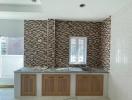 Modern kitchen with wooden cabinets and mosaic backsplash