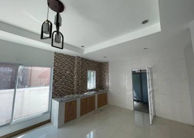 Modern kitchen with natural light and spacious countertops