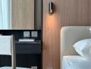 Minimalist bedroom with wooden door and elegant furnishings