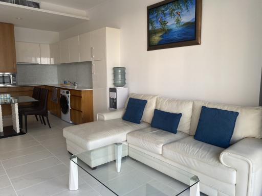 Modern living room with kitchenette and dining area