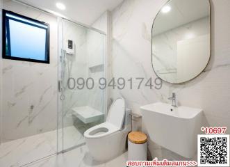 Modern Bathroom with White Marble Tiles and Glass Shower Enclosure