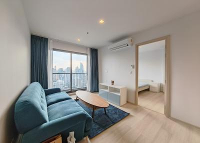 Modern living room with balcony and city view