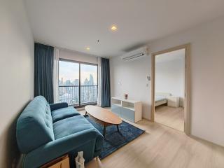 Modern living room with balcony and city view