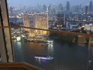 City view from high-rise apartment balcony at dusk