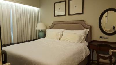 Elegant master bedroom with neutral color palette and tasteful decor