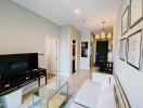 Bright and modern living room with dining area in the background