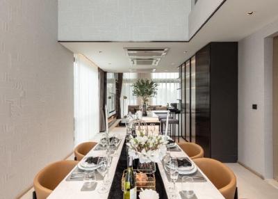 Elegant dining room with natural light and modern decor