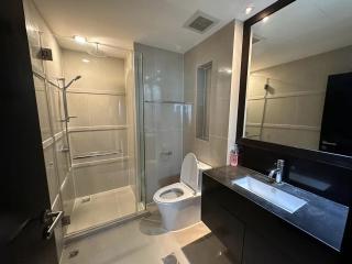 Modern bathroom interior with shower cabin and vanity