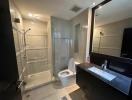 Modern bathroom interior with shower cabin and vanity
