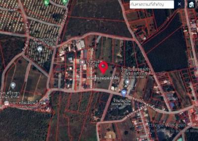 Satellite overview of a residential area with marked location