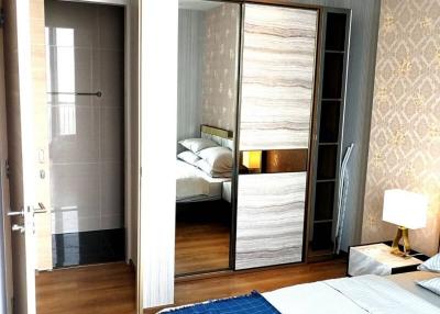 Cozy bedroom with attached bathroom and wardrobe