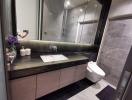 Modern bathroom interior with a shower cabin and vanity area