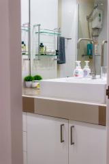 Modern bathroom interior with a well-lit vanity area