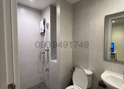 Modern bathroom interior with shower and toilet facilities