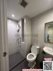 Modern bathroom interior with shower and toilet facilities