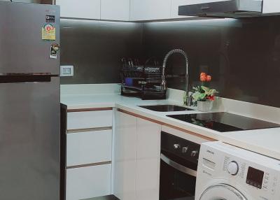 Modern kitchen with appliances and ample counter space