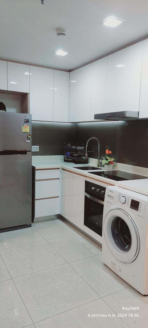 Modern kitchen with appliances and ample counter space