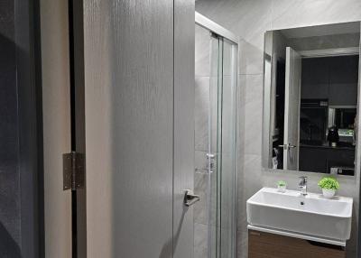Modern bathroom with glass shower and elegant vanity